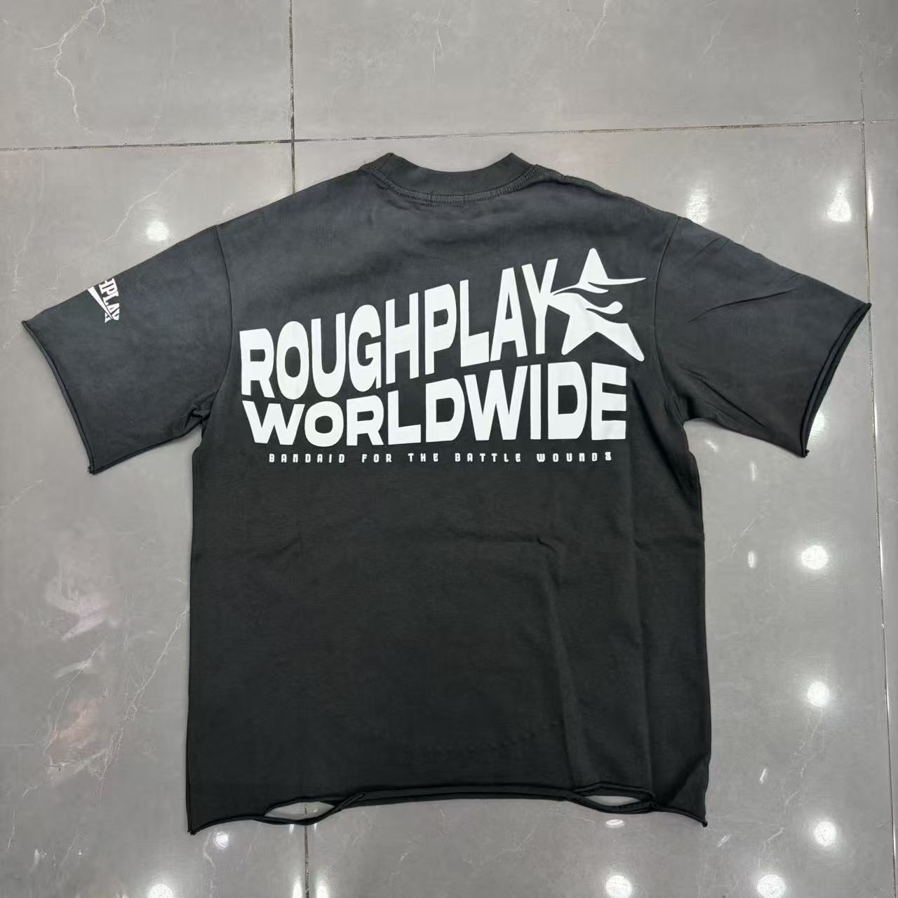 Roughplay Distressed Blue Circular R‑Logo Minimal Graphic Tee
